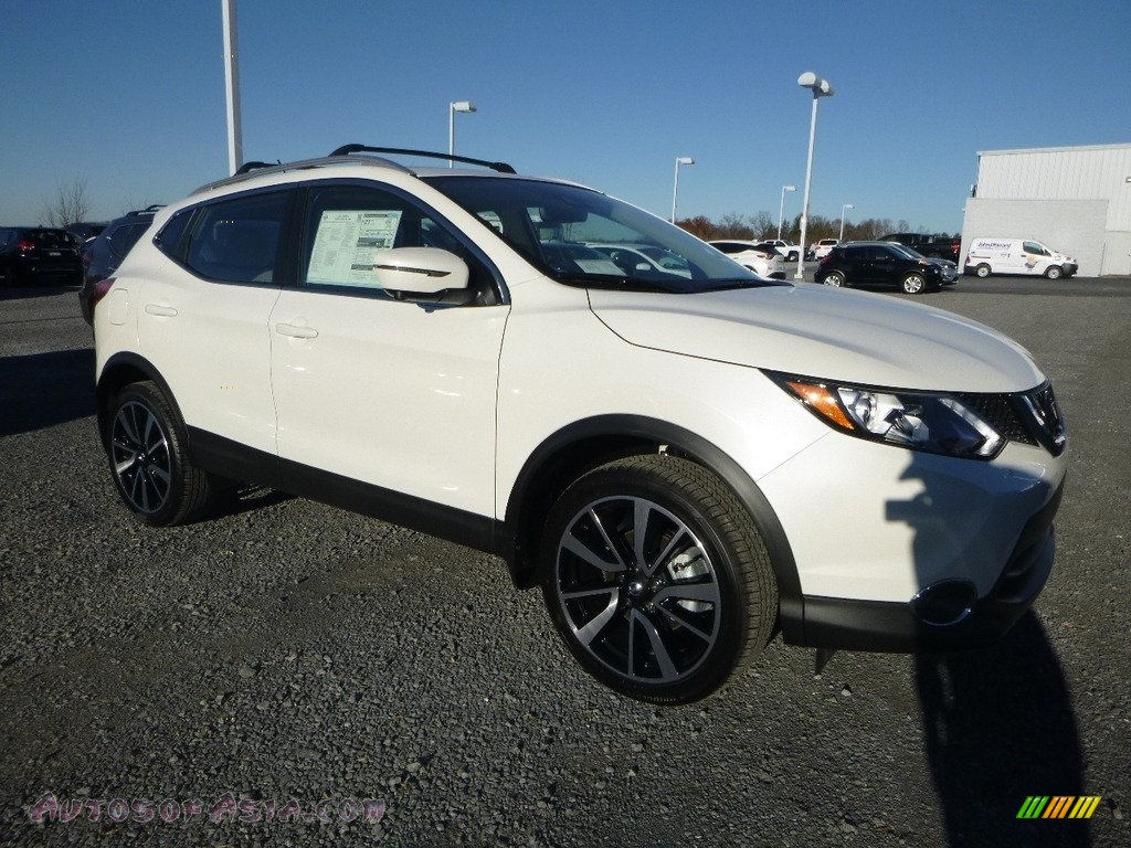 Pearl White / Charcoal Nissan Rogue Sport SL AWD