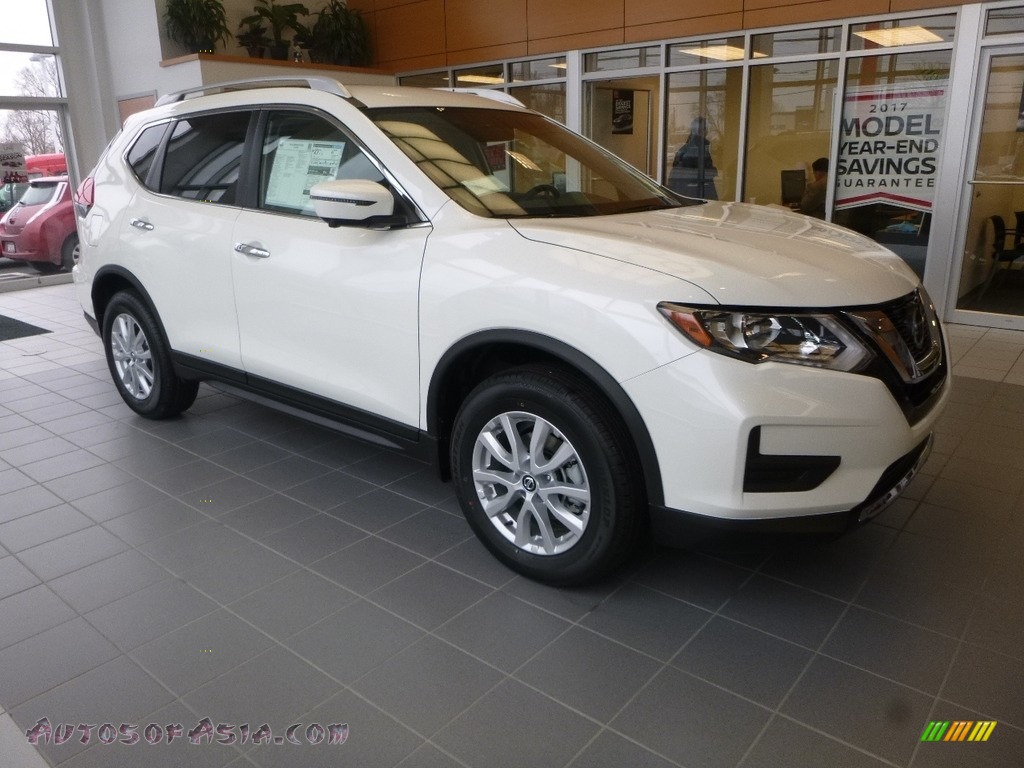 Pearl White / Almond Nissan Rogue SV AWD