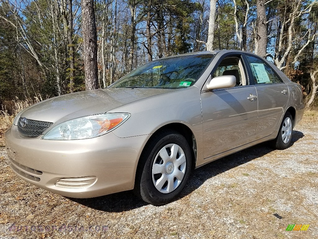Desert Sand Mica / Taupe Toyota Camry LE