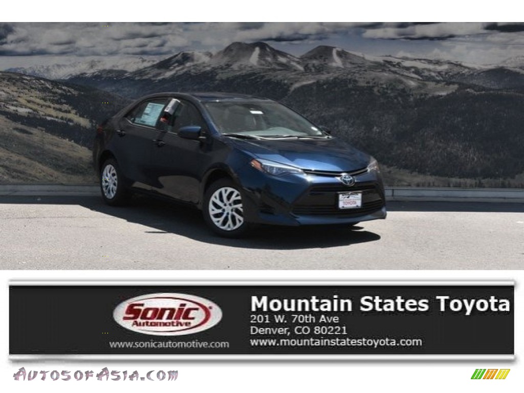 Galactic Aqua Mica / Ash/Dark Gray Toyota Corolla LE