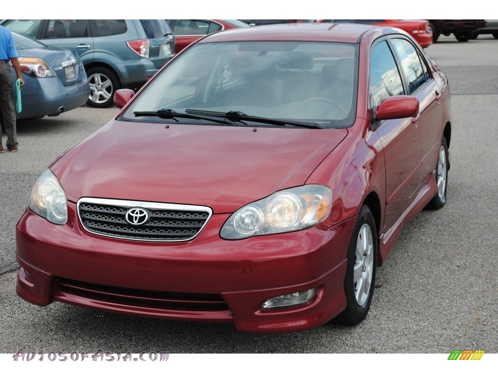 Impulse Red Pearl / Dark Charcoal Toyota Corolla S