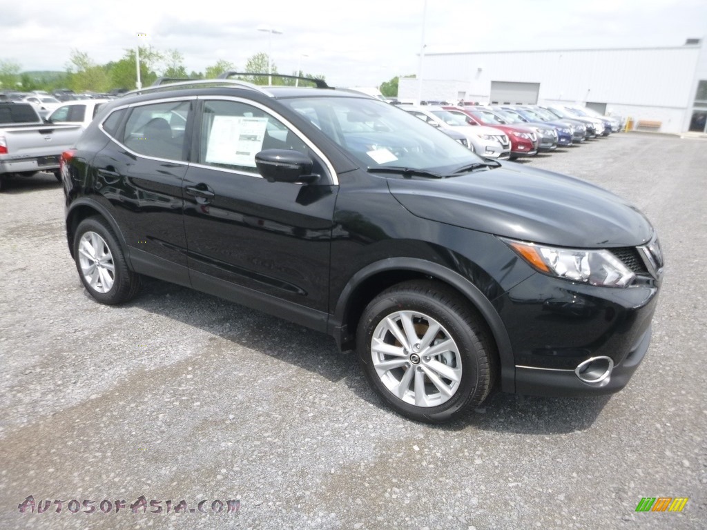 Magnetic Black Pearl / Charcoal Nissan Rogue Sport SV AWD