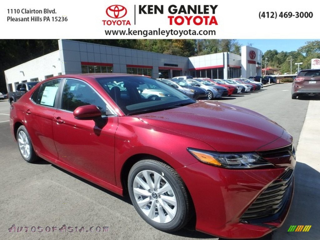 Ruby Flare Pearl / Black Toyota Camry LE