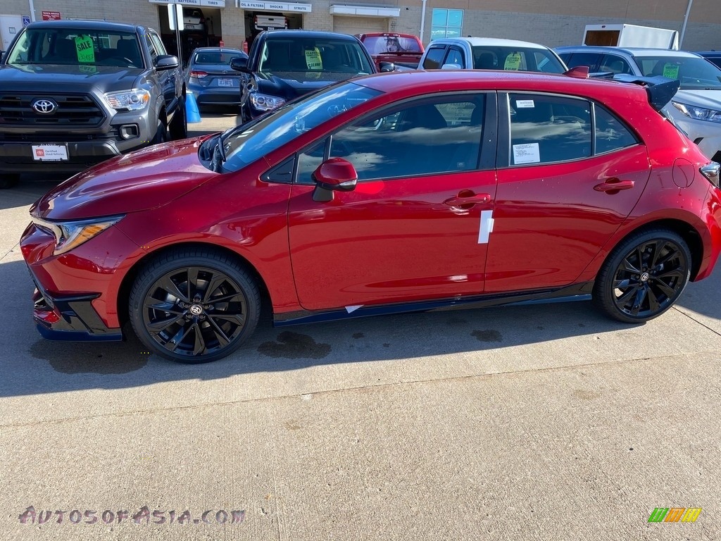 Supersonic Red / Black Toyota Corolla Hatchback SE