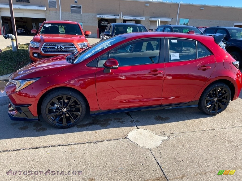 Supersonic Red / Black Toyota Corolla Hatchback SE